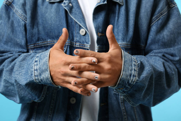 Man with crossed fingers and beautiful manicure, closeup - Photo, Image
