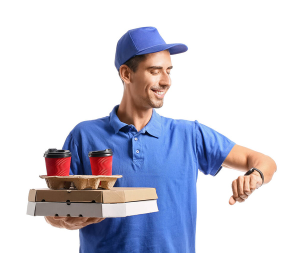 Courier of food delivery service with smartwatch on white background - Photo, Image