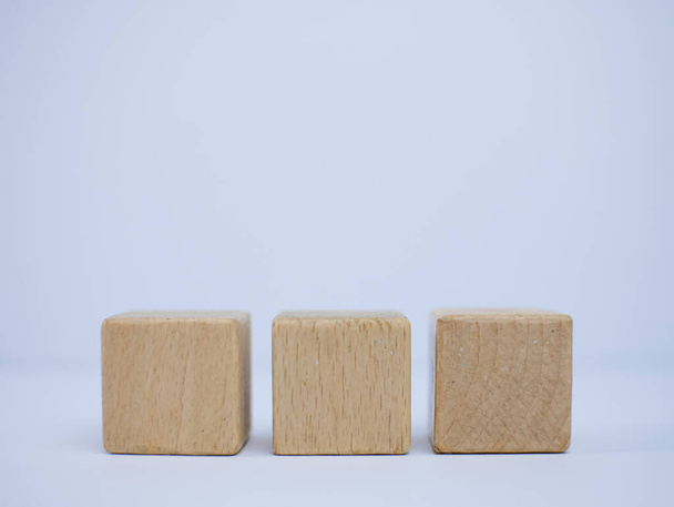 Wooden toy blocks is on white background - Фото, изображение