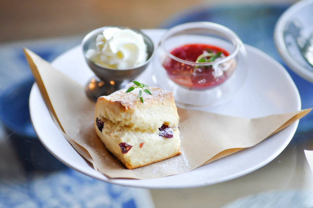 scone , cranberry scone or scone with whipped cream and strawberry dip - Foto, imagen