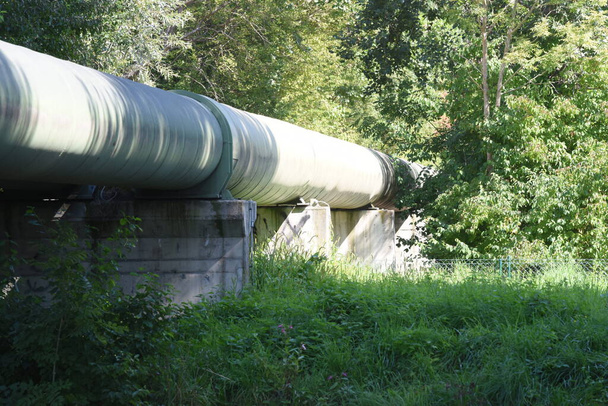 a district heating pipeline for heat transportation to a building - Photo, Image
