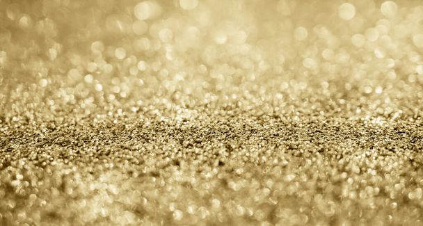 Abstract gold glitter sparkle blurred with bokeh background - Φωτογραφία, εικόνα