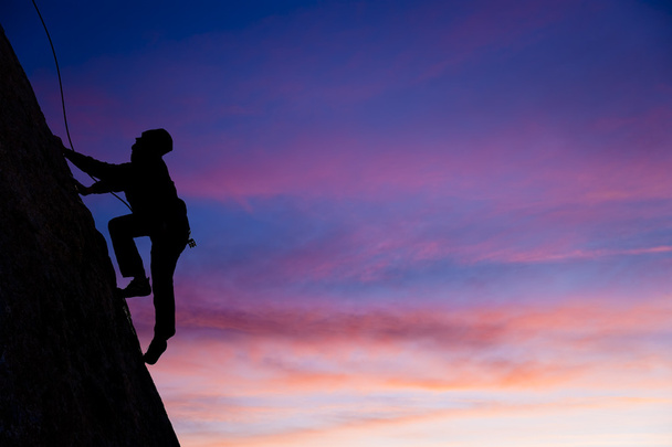 Rock climber silhouetted. - Photo, Image