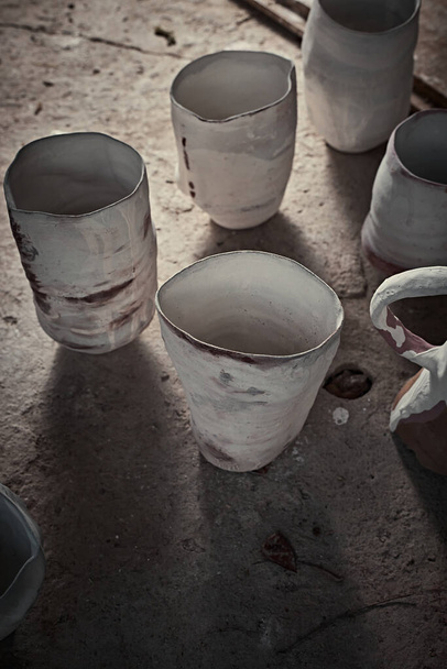 handmade ceramics, empty craft ceramic cup on gray backgroun - Valokuva, kuva