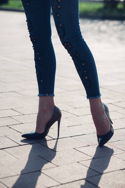 Woman in black high-heels. Closeup of female legs in high heels - Photo, Image