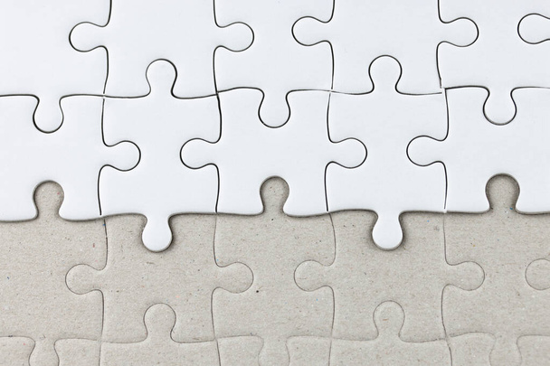White jigsaw puzzle as background - Фото, изображение