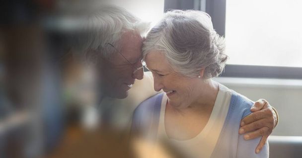 Blur effect with copy space against caucasian senior couple embracing each other at retirement home. retirement home concept - Фото, изображение