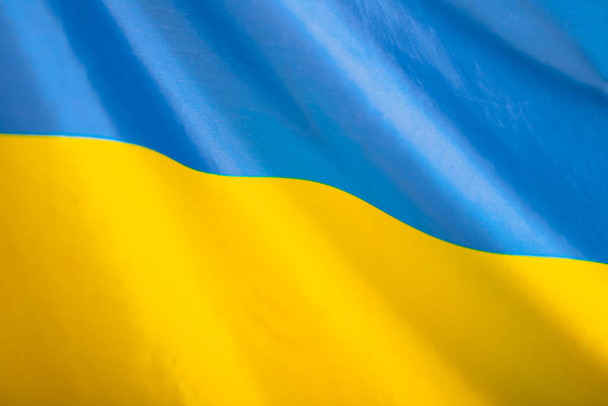 Flag of Ukraine. Blue and yellow colors. Close up shot, background - Photo, Image