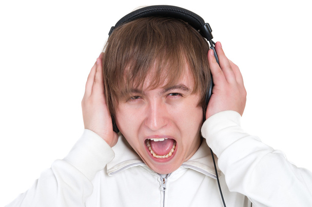 Man screaming with headphones - 写真・画像