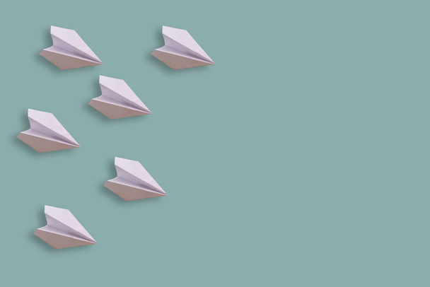 six paper airplanes isolated on a blue background - Photo, Image
