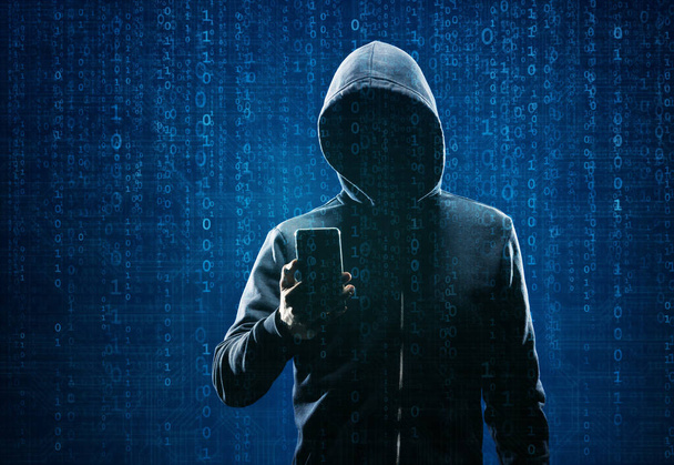 Computer Hacker in Hoodie. Obscured Dark Face. Hacker Attack, Virus Infected Software, Dark Web and Cyber Security Concept . - Foto, Imagen