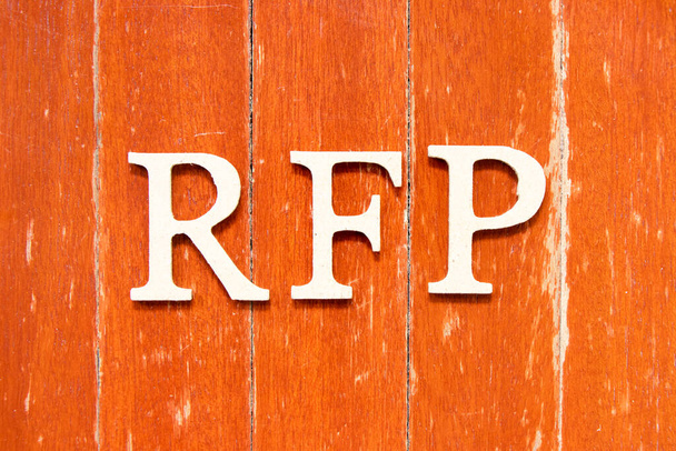 Alphabet letter in word  RFP (Abbreviation of request for proposal) on old red color wood plate background - Photo, Image
