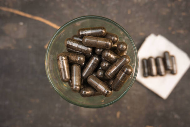 (habbatussauda) black cumin in capsules. body supplements. - Photo, Image