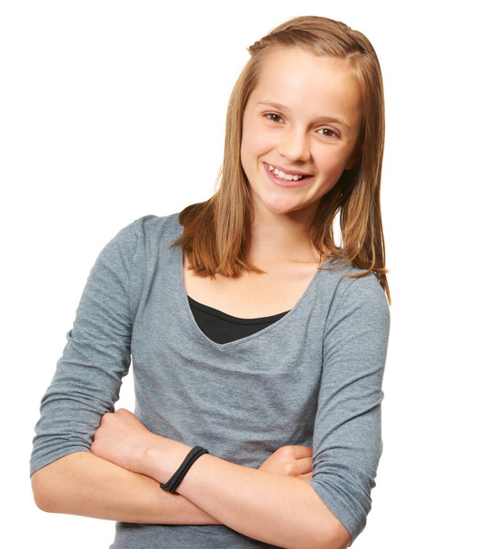 Carefree youth. Studio portrait of a young teenage girl standing against a white background. - Foto, Imagem