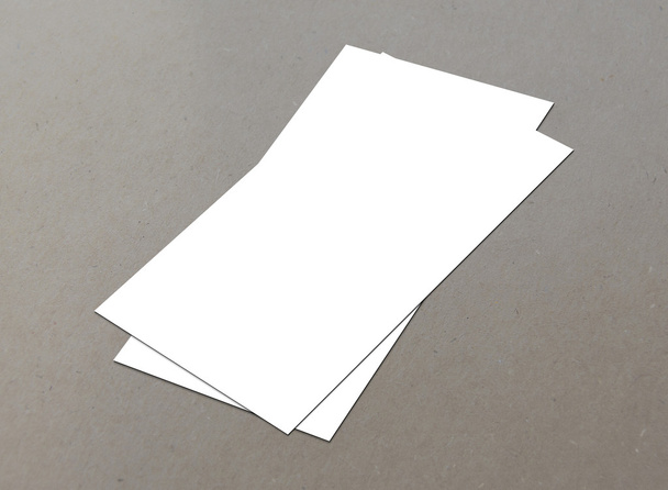 Blank white paper (4"x 8") flyer on floor - Photo, Image