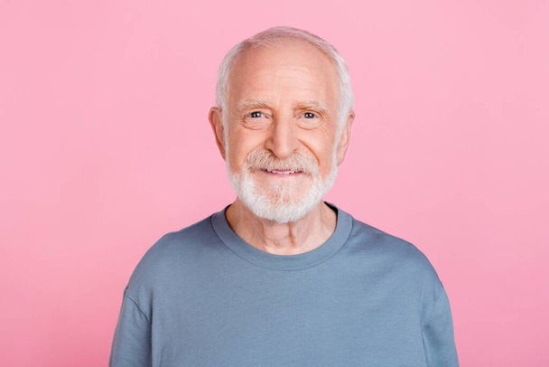 Photo of nice old grey hairdo man wear blue shirt isolated on pink color background - Foto, afbeelding