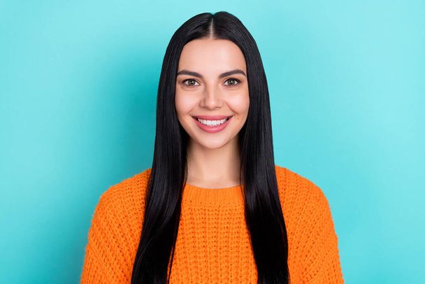 Photo of sweet shiny cute young lady dressed knitted pullover smiling isolated teal color background - Fotoğraf, Görsel