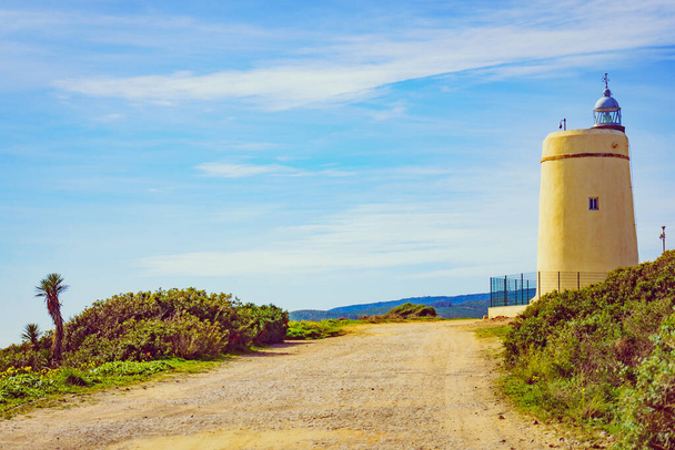 Carbonera lighthouse located on Punta Mala, La Alcaidesa, Spain. Lantern overlooks the Strait of Gibraltar. - 写真・画像