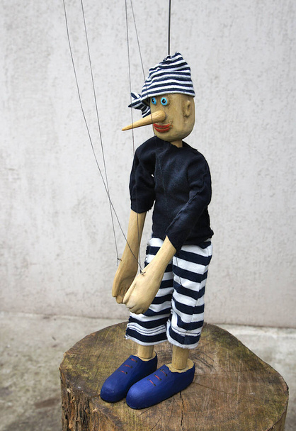 Funny wooden string operated puppet (marionette) from Ukraine - Φωτογραφία, εικόνα
