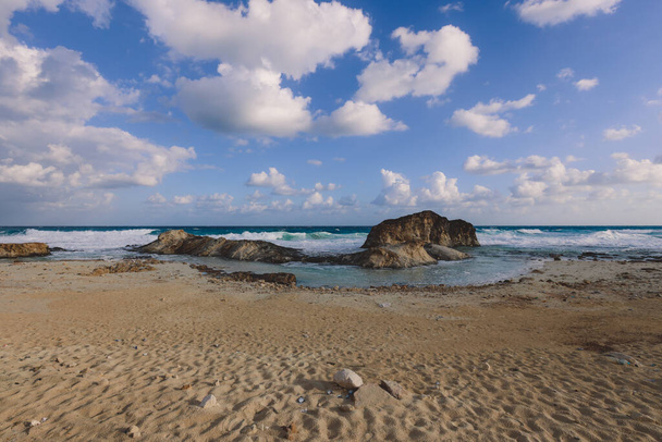 Windy and Rocky Coastline of the Mediterranean Sea in the Marsa Matruh city under Blue Cloudy sky with no People around, Egypt - Photo, Image
