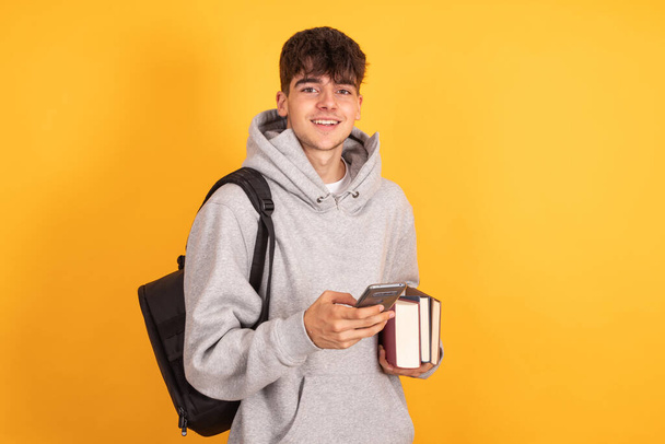 isolated student with mobile phone - Photo, Image