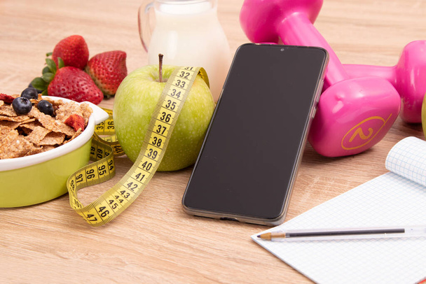 dieta e nutrizione sfondo con il telefono cellulare - Foto, immagini