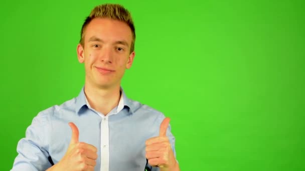 Man - green screen - portrait - man agrees (shows thumbs up for approval) - Footage, Video