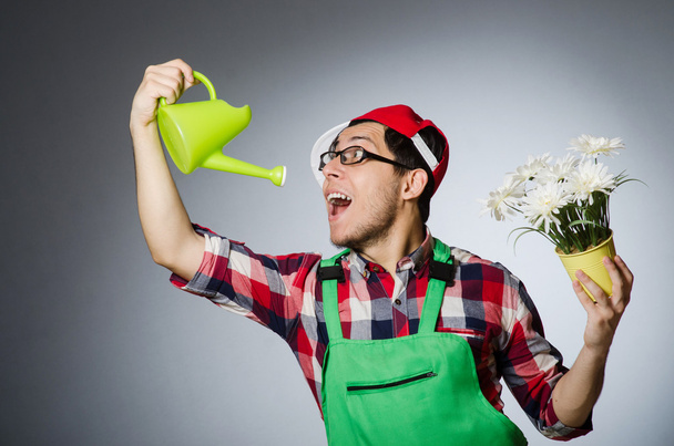 Funny man with watering can - Photo, Image