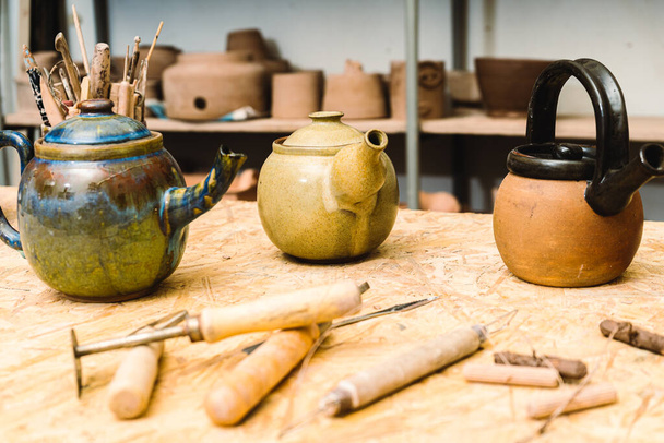 A handmade ceramic kettles or teapots - Φωτογραφία, εικόνα