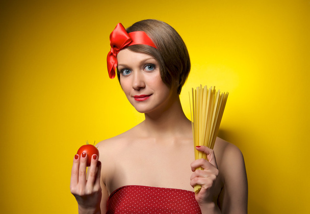 Young housewife in retro style - 写真・画像