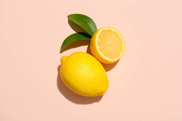 Ripe lemons on light color background, top view - Foto, immagini