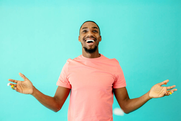 young african american man on blue background - Foto, immagini