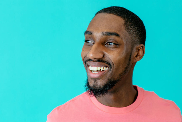 portrait of a smiling young african man - Fotó, kép