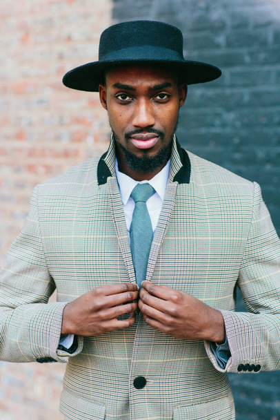 portrait of a young african american man in suit and hat - Photo, Image