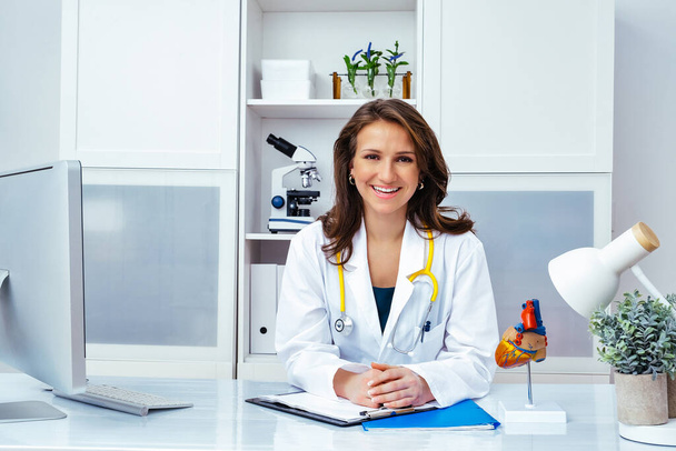 beautiful smiling female doctor in office - Photo, Image