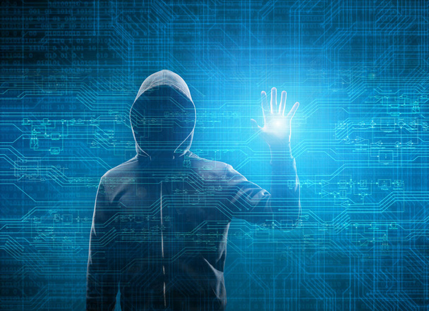 Computer Hacker in Hoodie. Obscured Dark Face. Hacker Attack, Virus Infected Software, Dark Web and Cyber Security Concept . - Foto, imagen