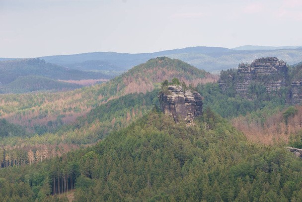 View over rock formations, hills and forest of National Park Saxon Switzerland, Germany - Photo, Image