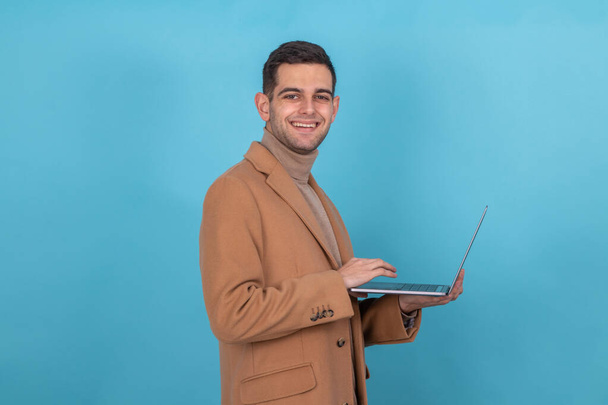 man with laptop isolated on background - Φωτογραφία, εικόνα