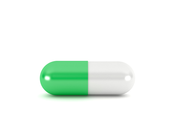 Green pill capsule isolated on white background, 3d rendering - Foto, Imagen