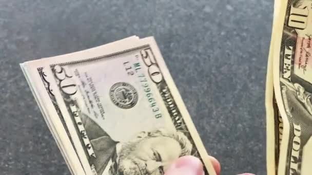Businessman hands counting dollar banknotes close up - Footage, Video