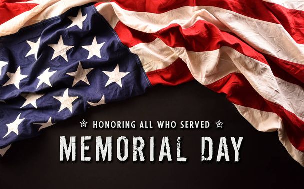 Happy memorial day concept made from American flag and the text on dark stone background. - Photo, Image