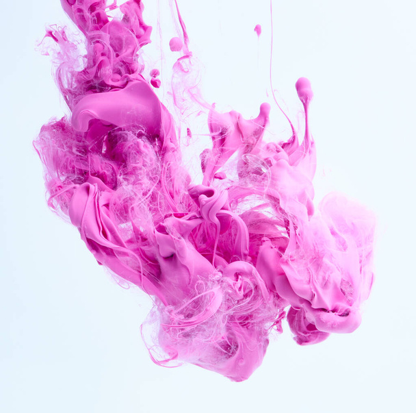 Abstract explosion pink paint splash background. Mixed ink in water - Zdjęcie, obraz
