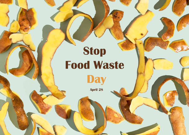 食品廃棄物の日を停止する概念。ジャガイモの皮は食糧準備の間に最も一般的に捨てられた項目の1つである。パターン、フラットレイアウト. - 写真・画像
