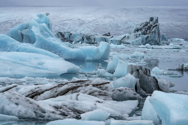 Massive Icebergs on Jokulsarlon lagoon in Iceland - Foto, afbeelding