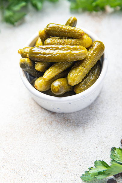 gherkins cucumbers salted pickled vegetable food meal food diet snack on the table copy space food background  - Photo, Image