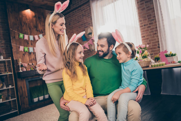 Portrait of attractive cheerful adorable family talking having fun domestic party custom festal event time wear costume indoors - Фото, зображення