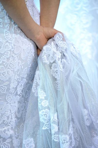 bride with veil on her wedding dress - Zdjęcie, obraz