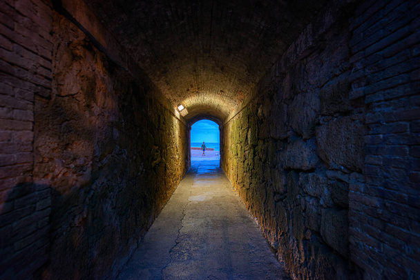 Old pedestrian tunnel with access to the Mediterranean Sea - Photo, Image