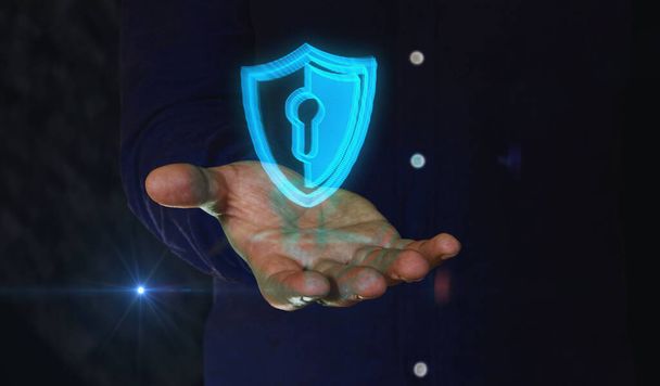 Ciberseguridad, protección de la red y datos digitales con escudo símbolo 3D sobre la mano del hombre. Icono de tecnología cibernética ilustración concepto abstracto. - Foto, Imagen