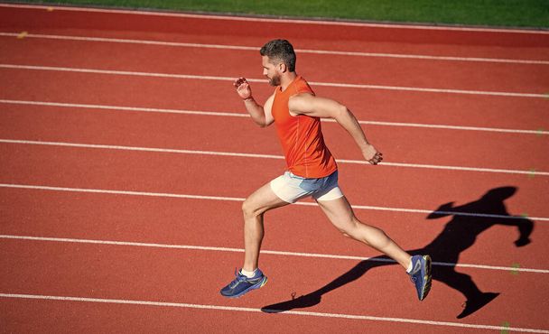 physical training. athletic guy run. challenge and competition. marathon speed. sprinter. - Foto, Bild